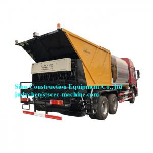 China Sinotruk Howo 8x4 4m Asphalt Crushed Stone Synchronous Chip Seal Truck on sale