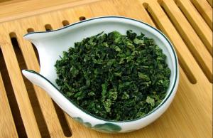 China Fujian Brown Crystal Organic Oolong Tea Iron Goddess Tea Leaves factory