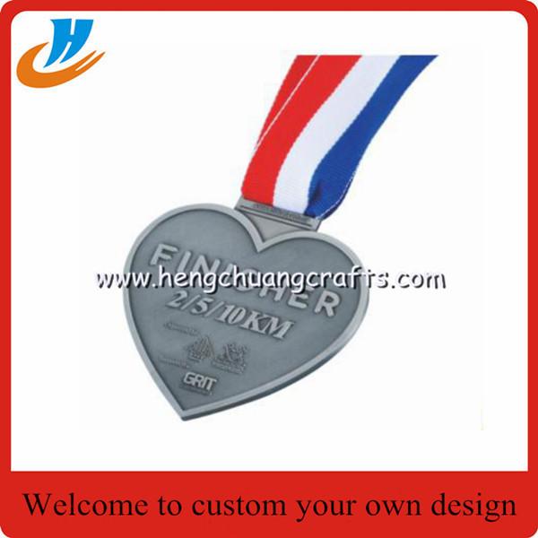 China Antique silver engraved running medals, antique silver sports running medals factory