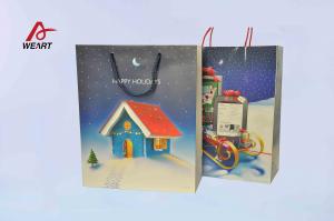 China Art Christmas Paper Bags , Unique Christmas Gift Bags Blue Cotton Handle factory