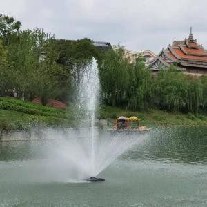 China Round Small Musical Dancing Floating Portable Decor Water Fountain For Lake on sale