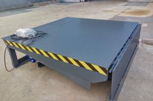 China Factory Loading Bay Machinery 380V 50HZ Electric 6000kg Dock Leveler For Warehouse Truck factory