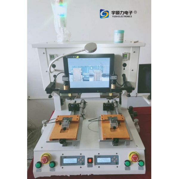 Detailed view of soldering machine mechanism