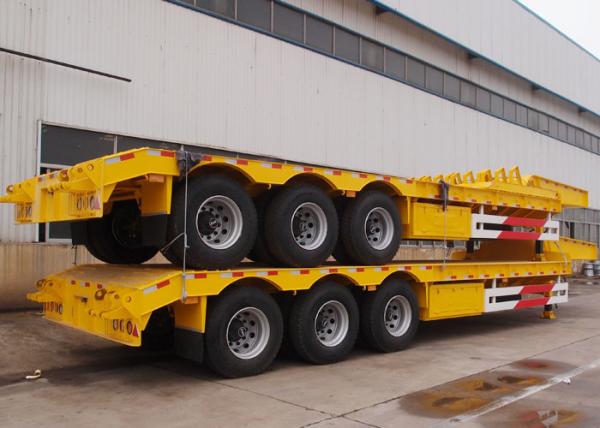 China CIMC 3 axle low bed platform trailer 2 axles low bed trailer for 30-90ton heavy duty machine transportation factory