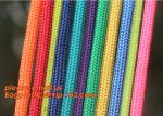 Children develop amusement projects supporting braided rope, for weaving various