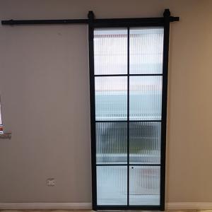 China Frosted Glass Aluminum Steel Frame Interior Barn Door With Sliding Hardware on sale