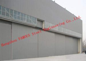China Hydraulic / Electrical Aircraft Hanger Door And Aviation Building Airplane Bifold Doors Vertical Lifting Systems factory