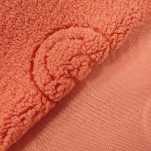 China 100% Polyester Sherpa Fabric Textile Warp Knitted Smilling Face Pattern Embossed factory