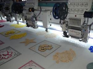 China Tai Sang Embro vista model 904+04(4 heads flat embroidery machine + 4 heads chenille embroidery machine) factory