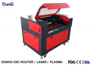 China Honey Table Reci Laser Tube CO2 Laser Engraving Machine For Fabric MDF Engraving factory