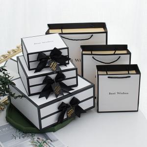 China Whole Sales Luxury Clothes Perfume Gift Set  Package Ribbon Bow Magnetic Closure Cardboard Folding Gift Box factory
