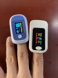 China Small OLED Fingertip Pulse Oximeter Manual Adjustable For SpO2 Pulse Monitoring factory