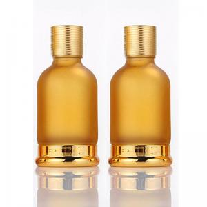 China Luxury Gold Dropper Frosted Glass Essential Oil Bottle Round Shape factory